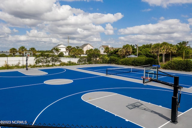 view of basketball court featuring tennis court