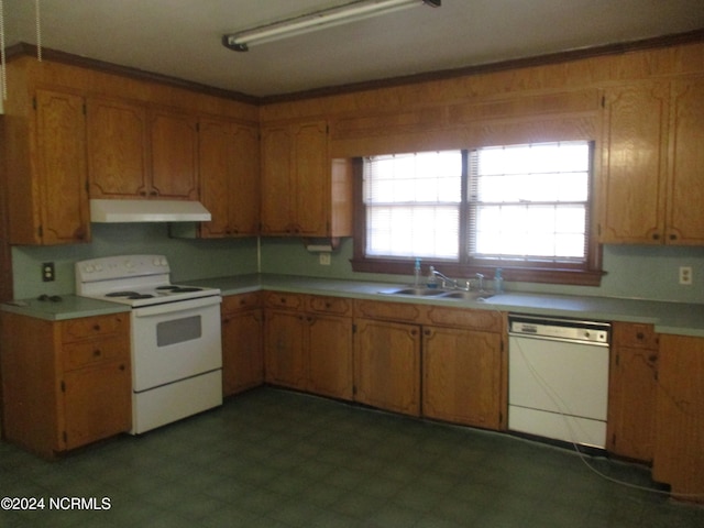 kitchen with white appliances and sink