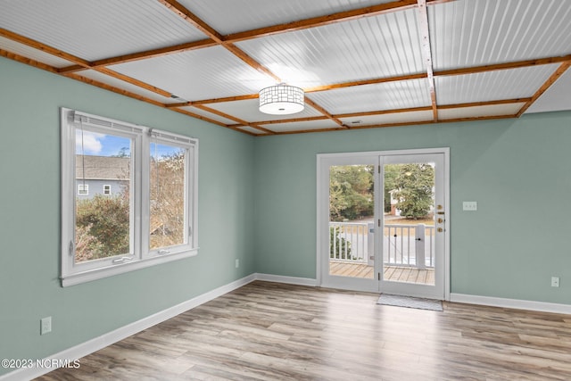 spare room featuring light hardwood / wood-style floors