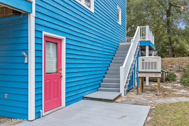 entrance to property with a deck