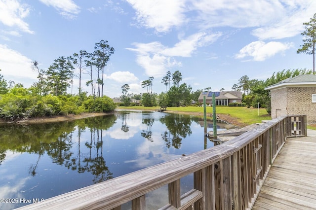 dock area featuring a water view