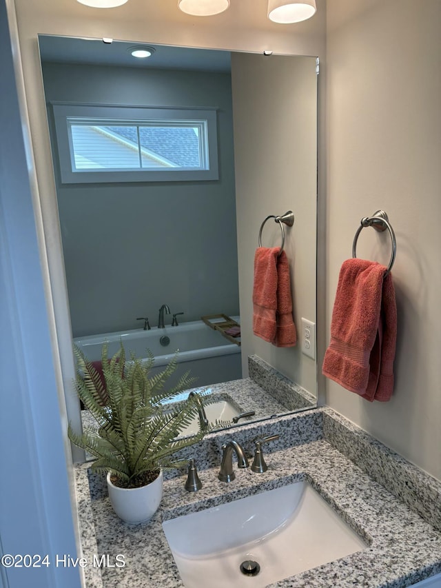 bathroom featuring vanity