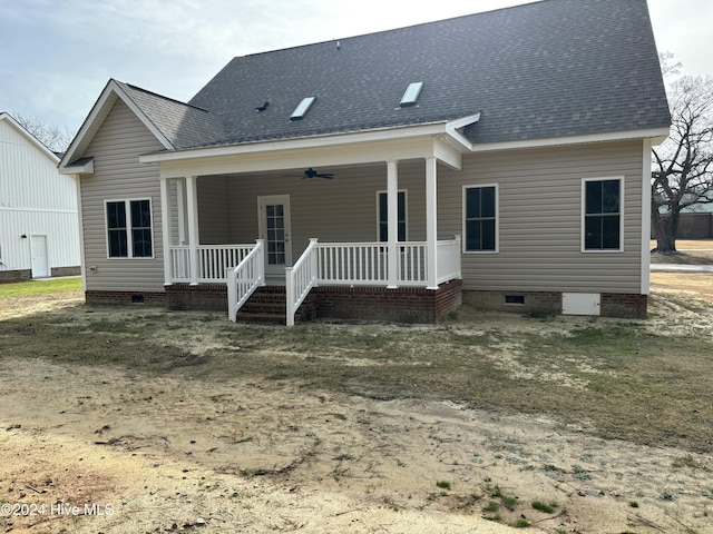 back of property featuring covered porch