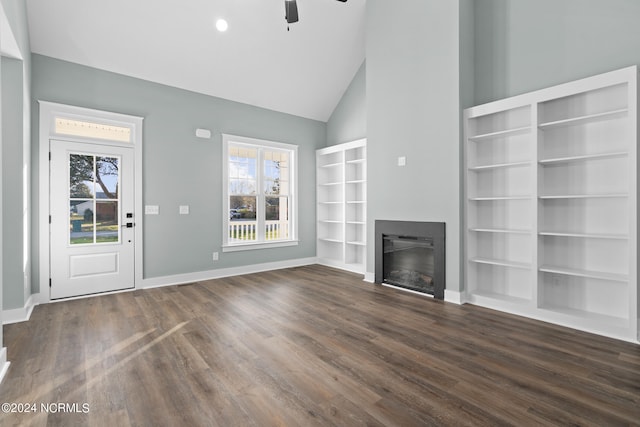 unfurnished living room featuring ceiling fan, built in features, high vaulted ceiling, and dark hardwood / wood-style floors