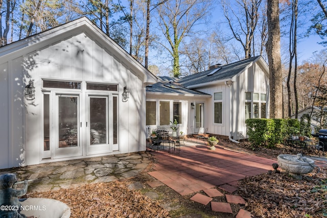 back of house with a patio area