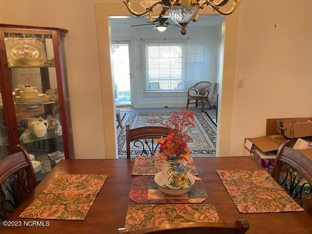 dining room featuring a notable chandelier