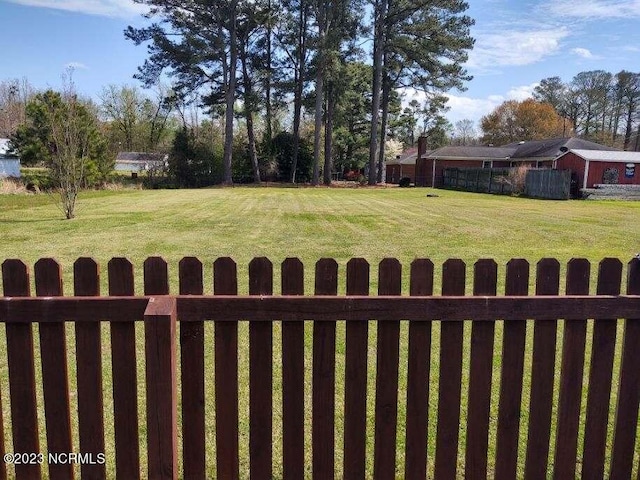 view of yard featuring fence