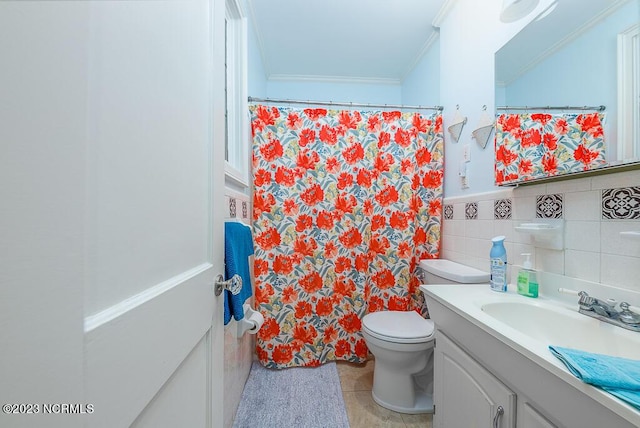 bathroom featuring tile patterned flooring, vanity, toilet, and ornamental molding