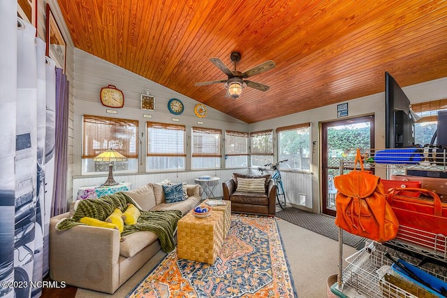 sunroom / solarium with wooden ceiling, a wealth of natural light, and lofted ceiling