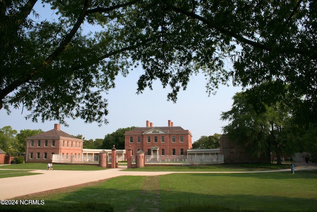 view of community featuring a lawn