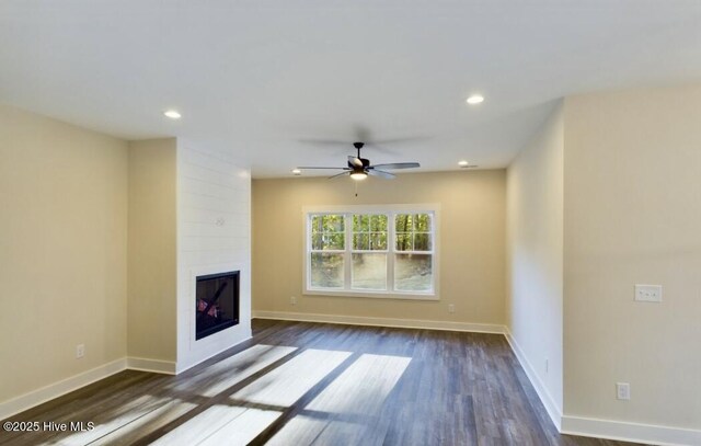 unfurnished room featuring light carpet