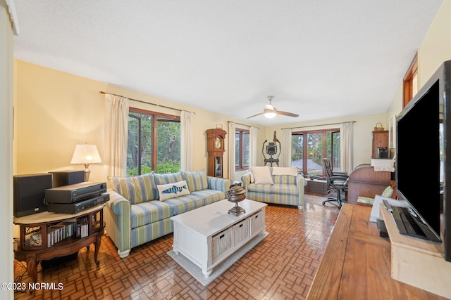 living room with ceiling fan