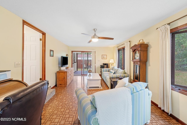 living room with ceiling fan