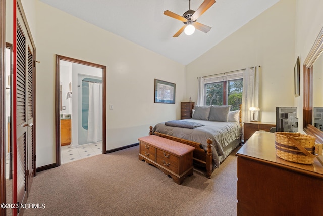 carpeted bedroom with high vaulted ceiling and ceiling fan