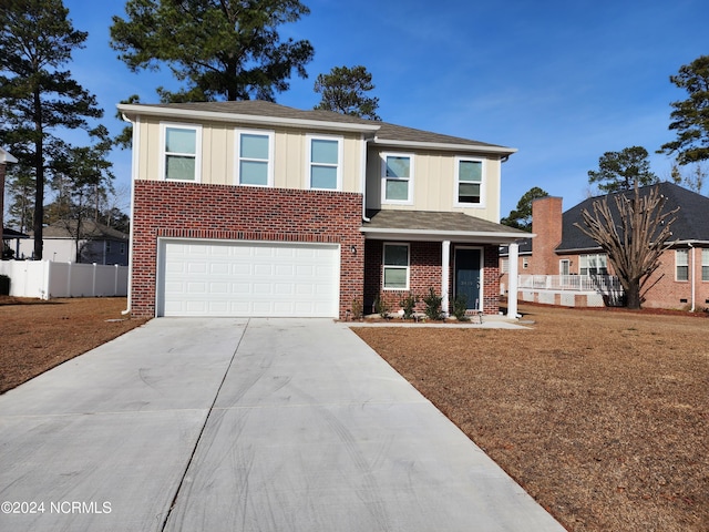 view of front of property with a garage