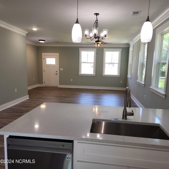 kitchen with sink, hanging light fixtures, stainless steel dishwasher, and dark wood-type flooring