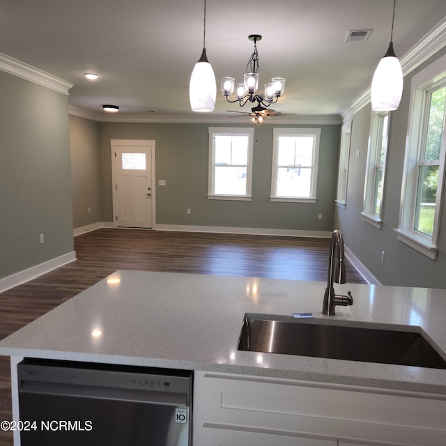 kitchen featuring sink, crown molding, a wealth of natural light, and dishwasher