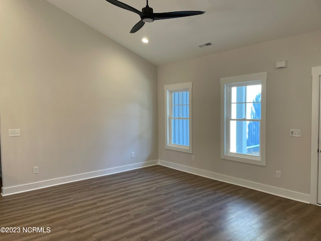 unfurnished room with dark hardwood / wood-style floors, ceiling fan, and lofted ceiling