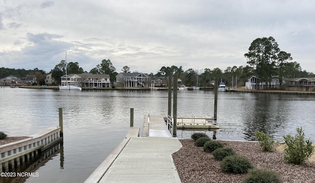 view of dock with a water view