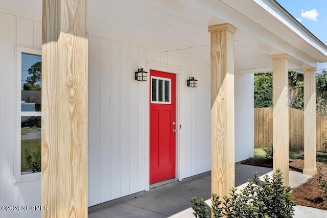 doorway to property featuring a porch