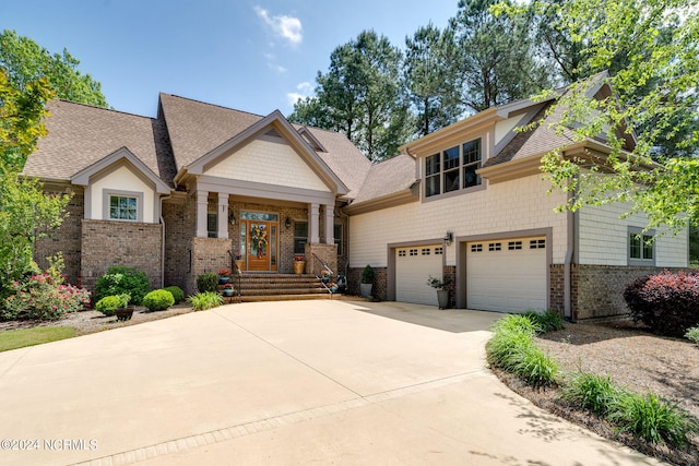 craftsman house featuring a garage