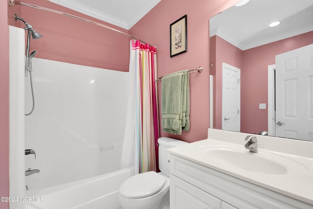 full bathroom featuring oversized vanity, crown molding, toilet, and shower / tub combo with curtain