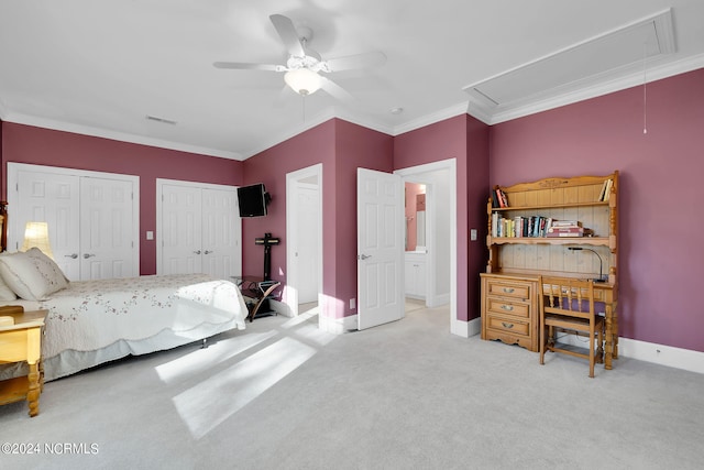 bedroom with two closets, ceiling fan, light carpet, and ornamental molding