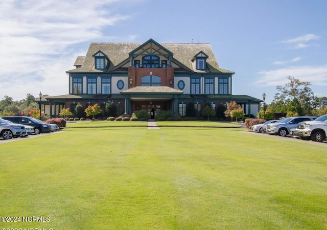 view of front of home with a front yard