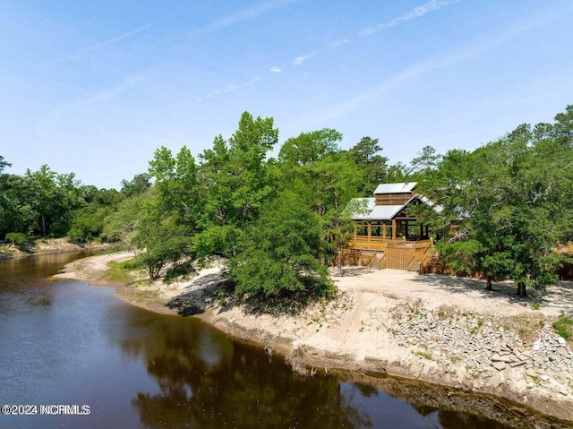 exterior space with a water view