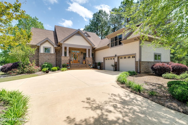 craftsman-style home featuring a garage