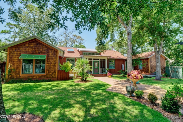 exterior space featuring a lawn