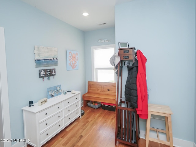 interior space featuring recessed lighting, visible vents, and light wood-style flooring