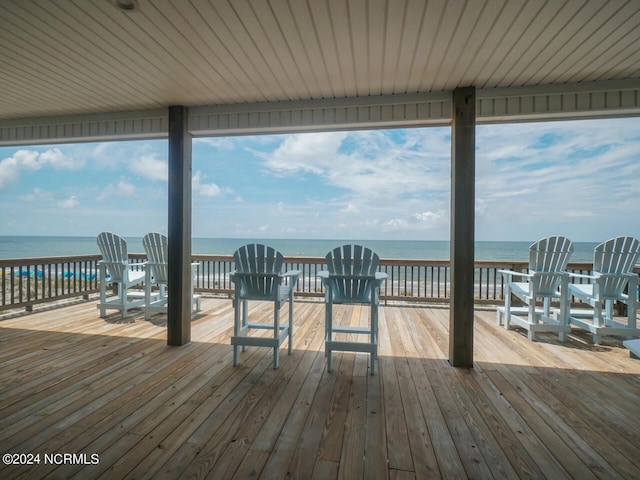 dock area with a deck with water view