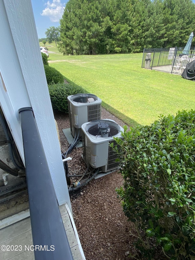 exterior view of cooling unit and fence