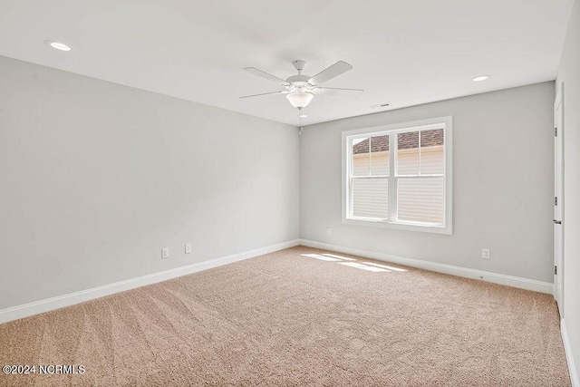 carpeted empty room with ceiling fan