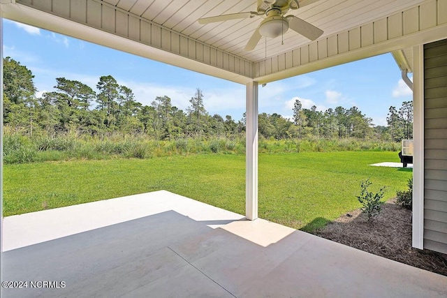 view of patio featuring ceiling fan