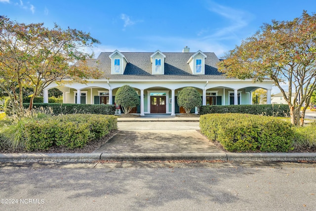 view of new england style home