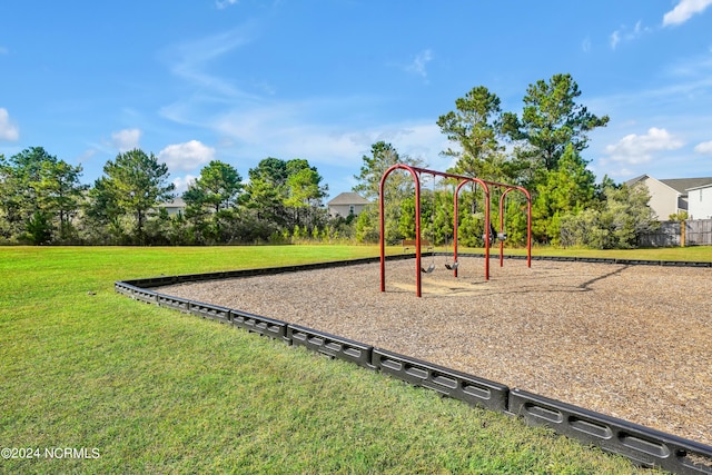 view of jungle gym with a yard