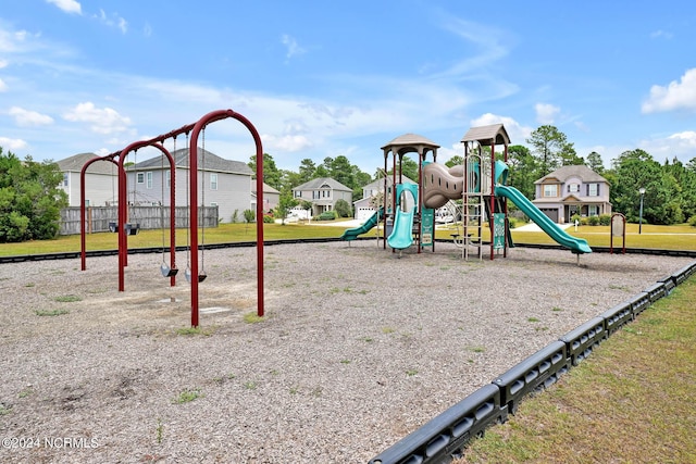 view of playground with a yard