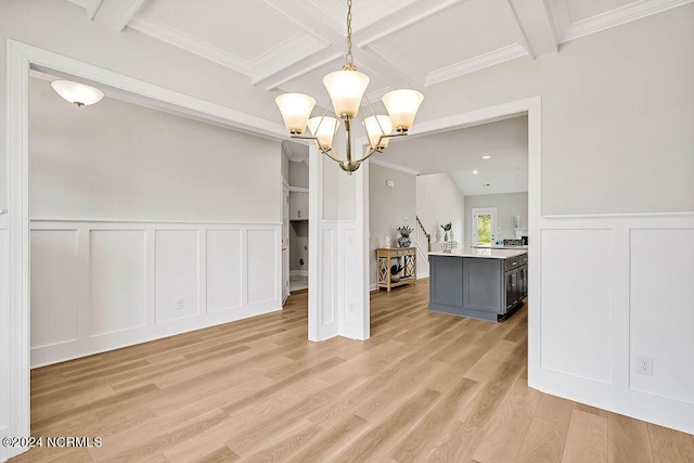 dining space with beamed ceiling, crown molding, light hardwood / wood-style floors, and a notable chandelier