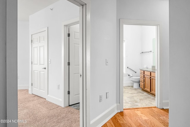 hallway featuring light hardwood / wood-style floors