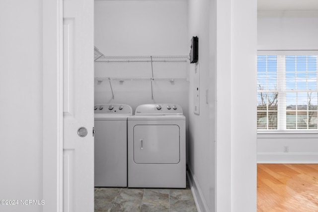 laundry room featuring separate washer and dryer