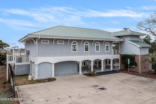 view of front of home with a carport