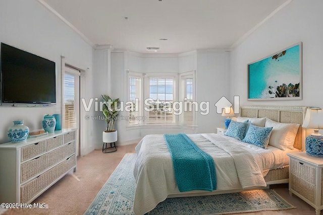 bedroom with crown molding and light carpet