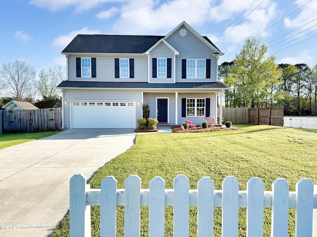 traditional home with an attached garage, driveway, a front lawn, and a fenced front yard