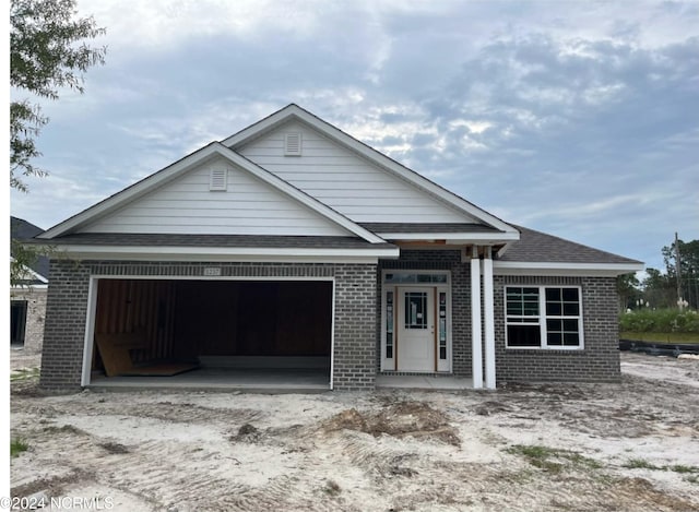 view of front of property featuring a garage