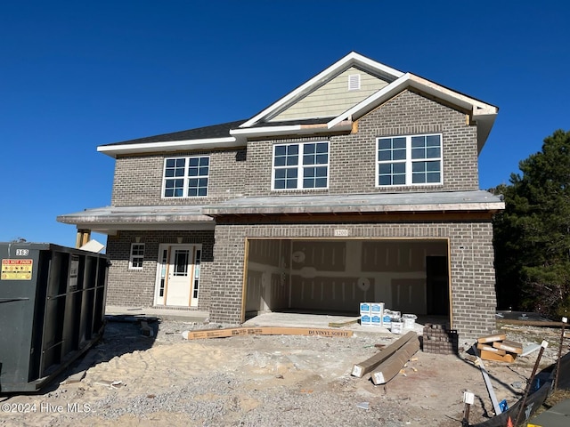 view of front of home featuring a garage