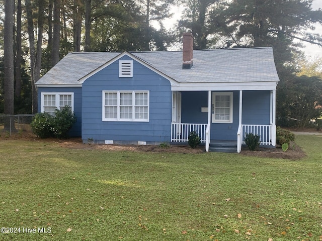 1306 N Respess St, Washington, NC 27889 - bungalow with a chimney, covered porch, crawl space, and roof with shingles