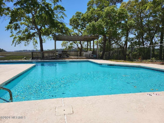 view of pool featuring a pergola