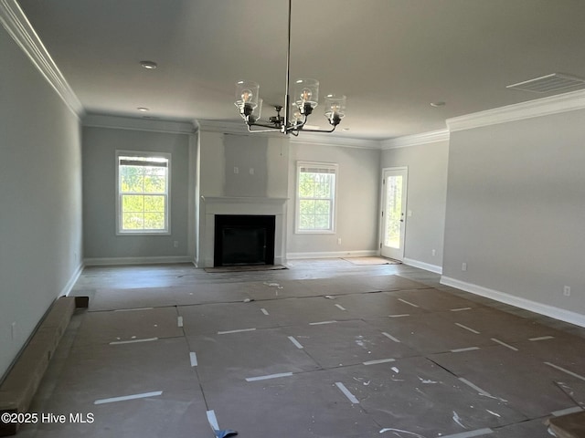 1224 Mandevilla Dr SE, Bolivia, NC 28422 - unfurnished living room with crown molding, plenty of natural light, a chandelier, baseboards, and a fireplace